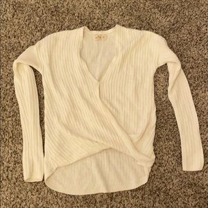 small cream colored sweater